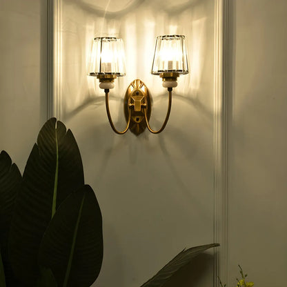 Elegant Brass Wall Sconce with Crystal Shade