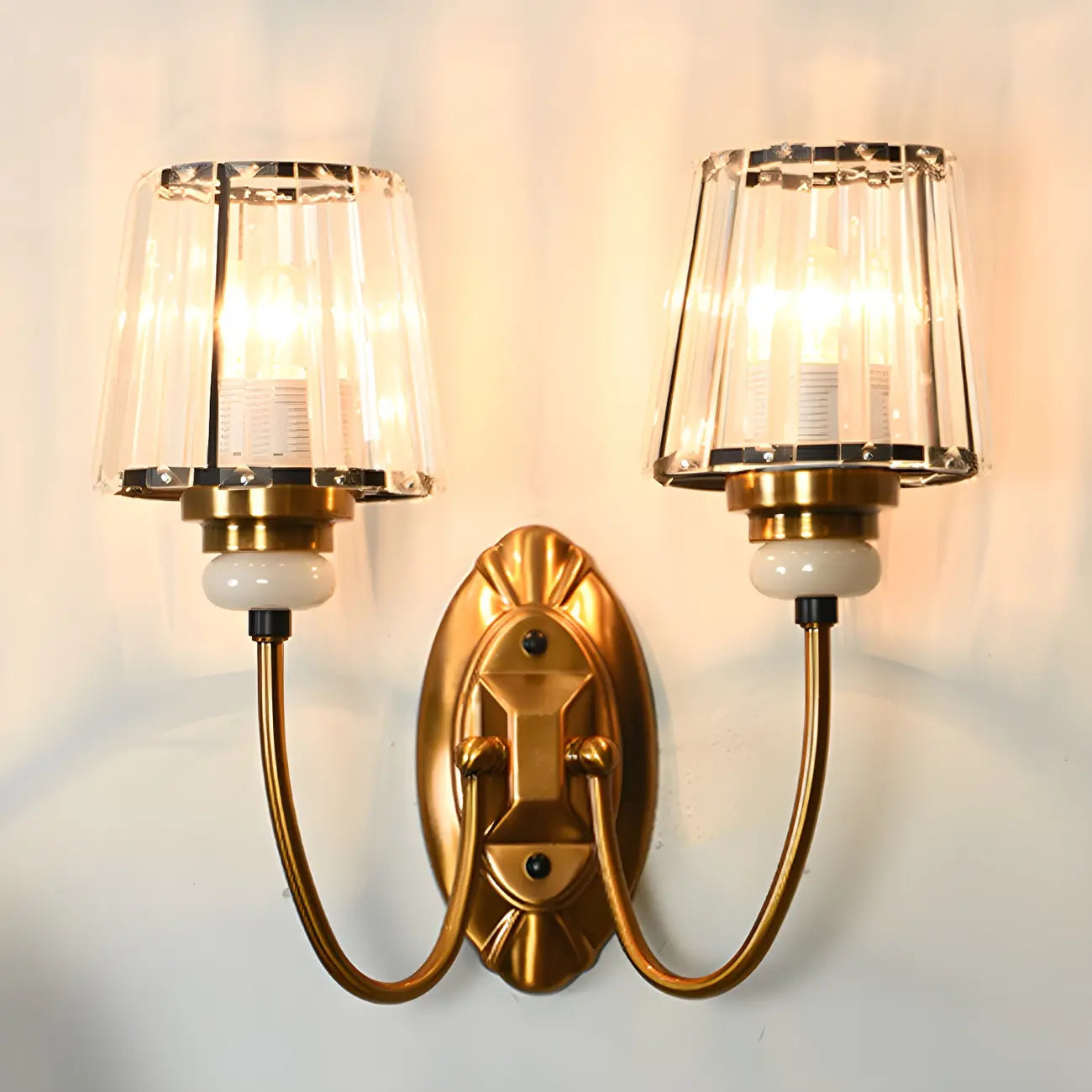 Elegant Brass Wall Sconce with Crystal Shade
