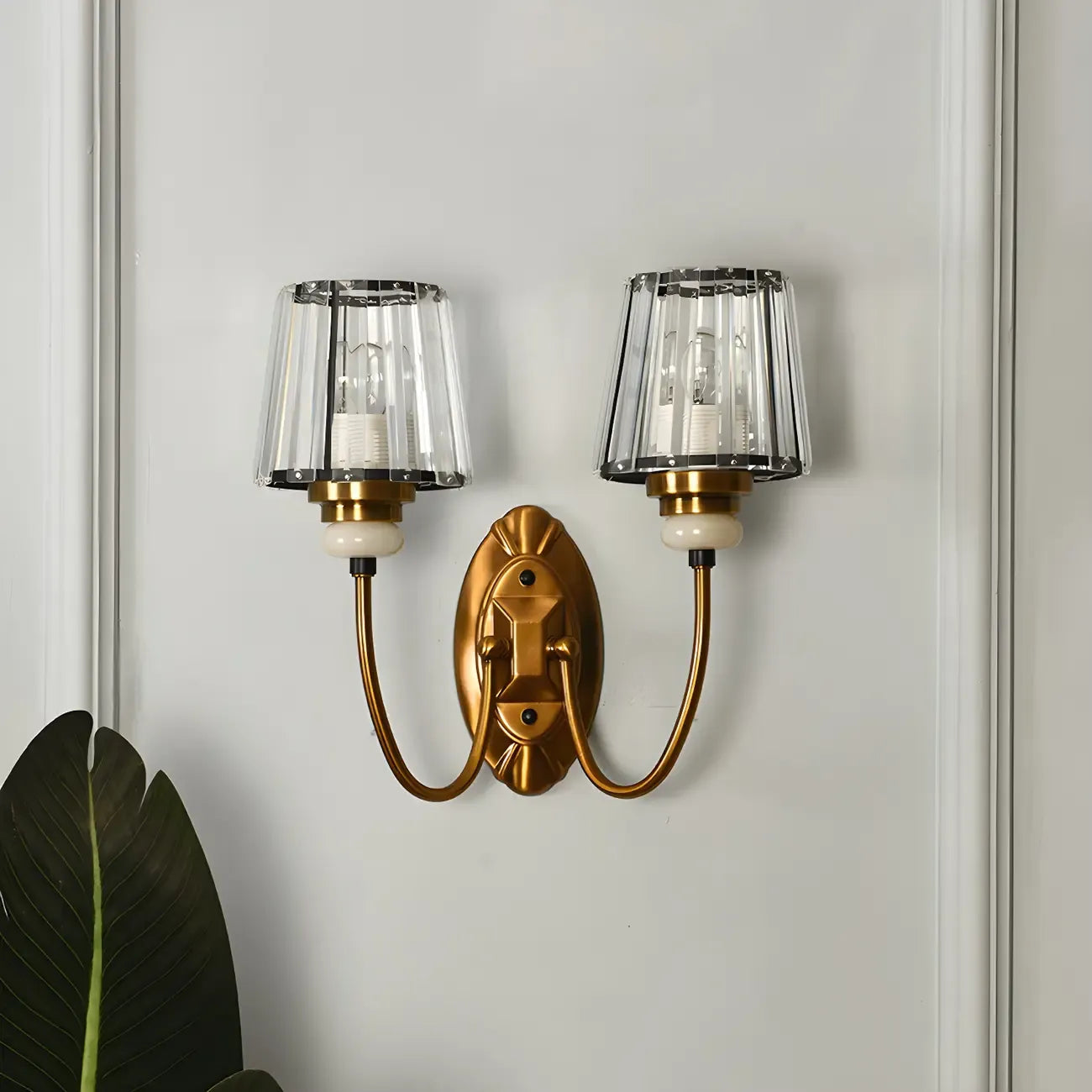 Elegant Brass Wall Sconce with Crystal Shade