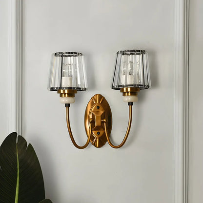 Elegant Brass Wall Sconce with Crystal Shade